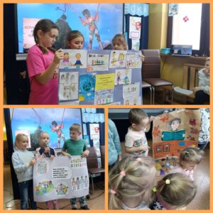 Oddział przedszkolny, klasa I i klasa II podczas prezentacji plakatów.
