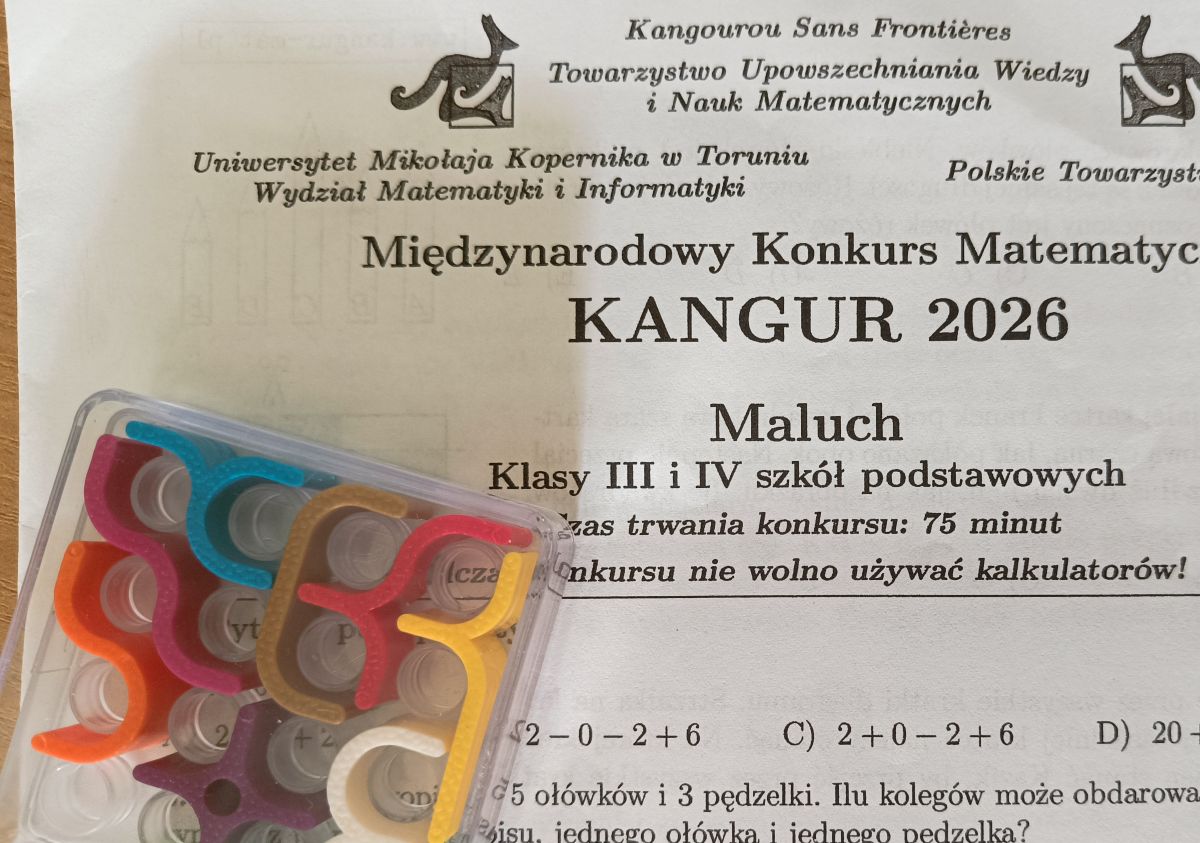 Arkusz konkursowy i zabawka konkursowa.